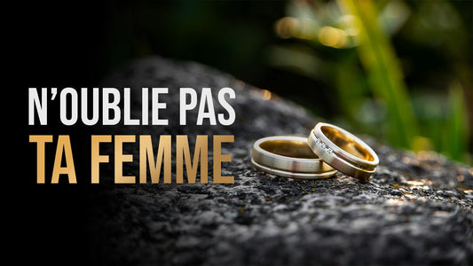 Deux alliances posées sur une pierre, titre N'oublie pas ta femme